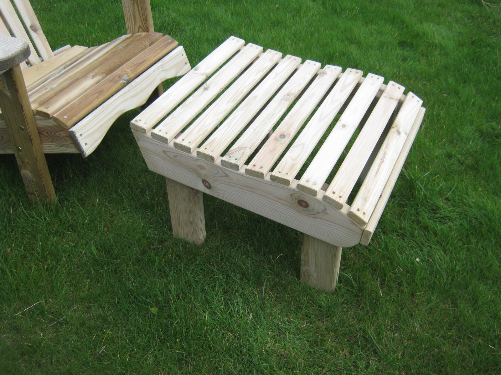 Two white painted wooden footstools on a garden lawn - Greenhouse Staging
