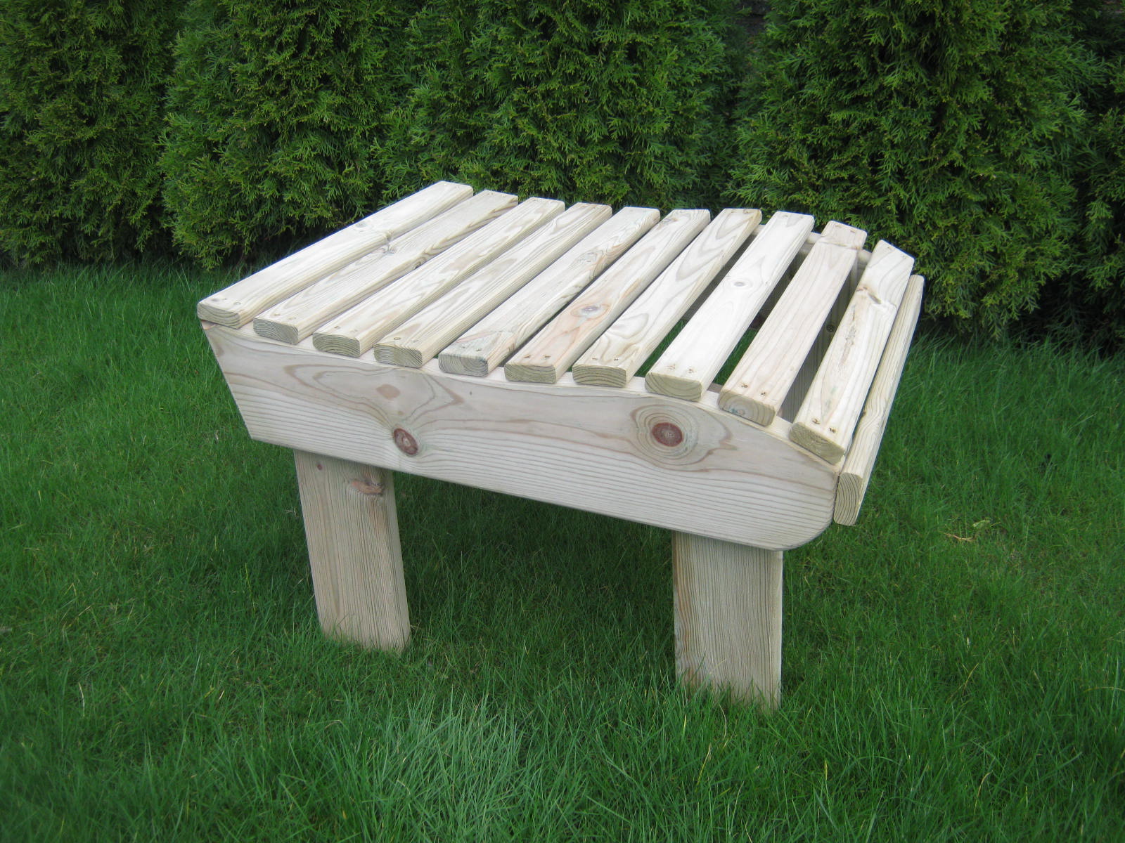 White painted wooden footstool with a slatted top on grass - Greenhouse Staging